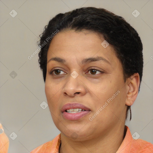 Joyful white adult female with short  brown hair and brown eyes