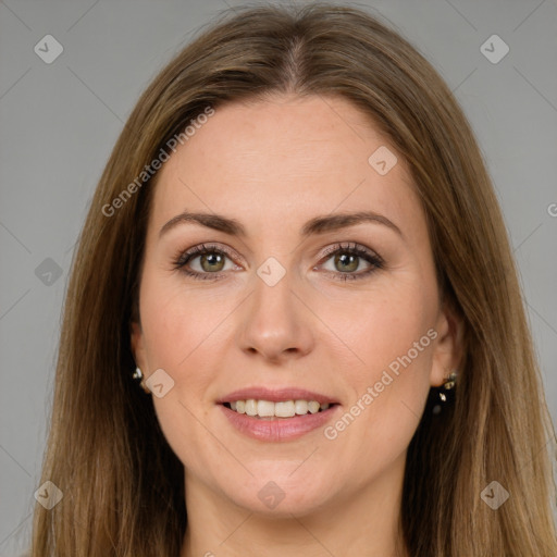 Joyful white young-adult female with long  brown hair and brown eyes