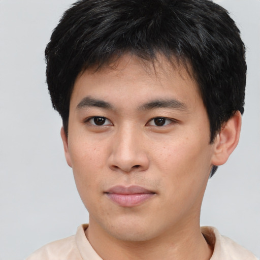 Neutral asian young-adult male with short  brown hair and brown eyes