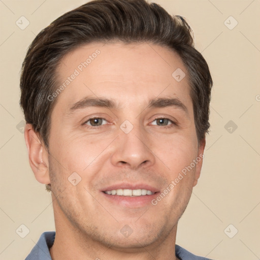 Joyful white adult male with short  brown hair and brown eyes