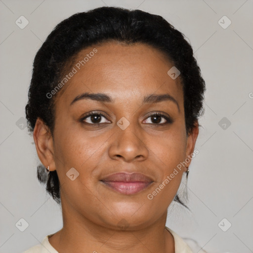 Joyful black adult female with short  brown hair and brown eyes