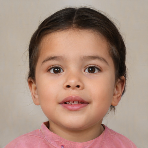 Joyful white child female with medium  brown hair and brown eyes