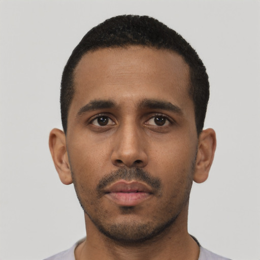 Neutral black young-adult male with short  black hair and brown eyes