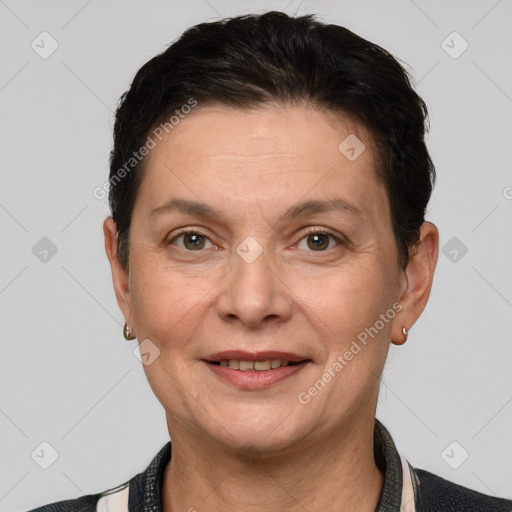 Joyful white adult female with short  brown hair and grey eyes