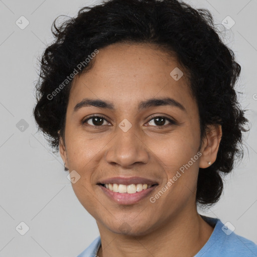 Joyful latino young-adult female with medium  brown hair and brown eyes