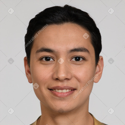 Joyful white young-adult male with short  black hair and brown eyes