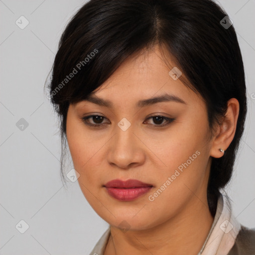 Joyful asian young-adult female with medium  brown hair and brown eyes