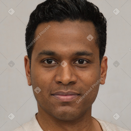 Joyful latino young-adult male with short  black hair and brown eyes