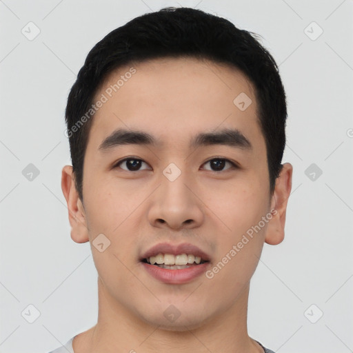 Joyful asian young-adult male with short  black hair and brown eyes