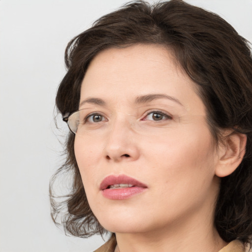 Neutral white young-adult female with medium  brown hair and brown eyes