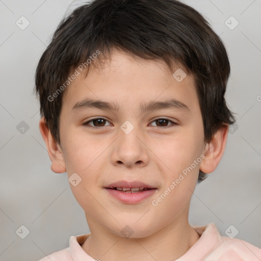 Joyful white child male with short  brown hair and brown eyes