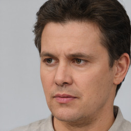 Neutral white adult male with short  brown hair and brown eyes