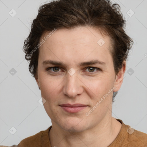 Joyful white adult female with short  brown hair and grey eyes