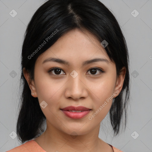 Joyful asian young-adult female with medium  black hair and brown eyes