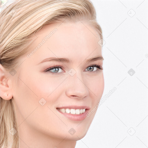 Joyful white young-adult female with long  brown hair and blue eyes