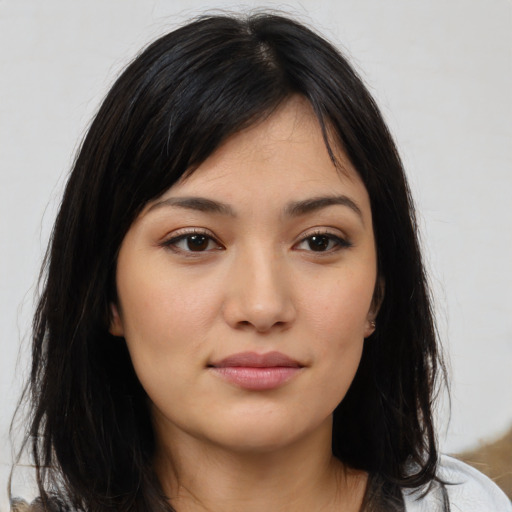 Joyful white young-adult female with medium  black hair and brown eyes