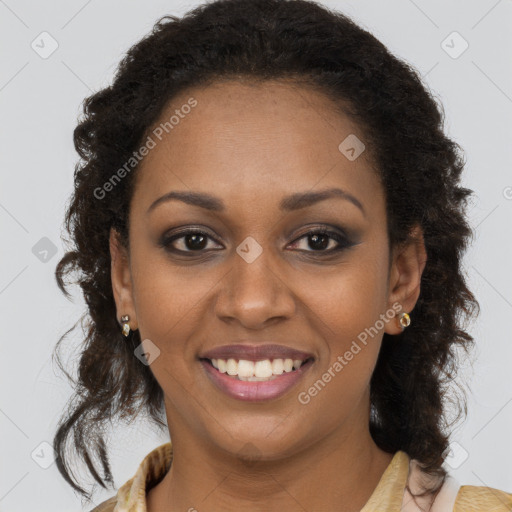 Joyful black young-adult female with medium  brown hair and brown eyes