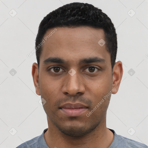Neutral latino young-adult male with short  black hair and brown eyes
