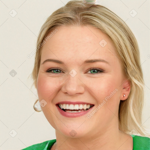 Joyful white young-adult female with medium  brown hair and green eyes