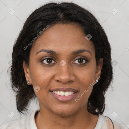 Joyful black young-adult female with medium  brown hair and brown eyes