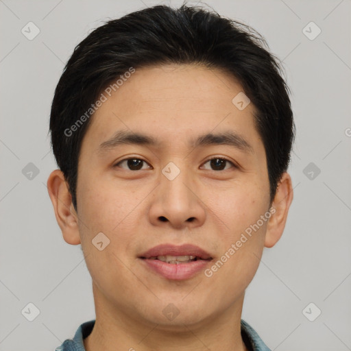 Joyful asian young-adult male with short  brown hair and brown eyes