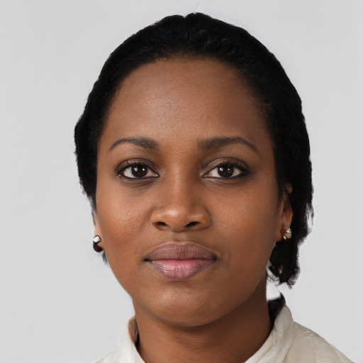 Neutral black young-adult female with short  black hair and brown eyes