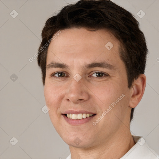 Joyful white young-adult male with short  brown hair and brown eyes