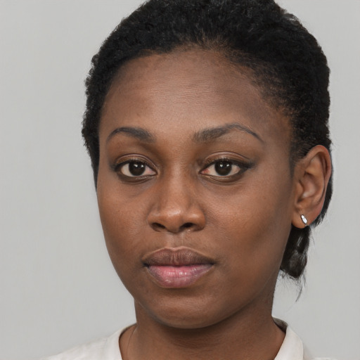 Neutral black young-adult female with short  black hair and brown eyes