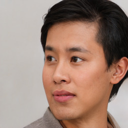 Neutral asian young-adult male with short  brown hair and brown eyes