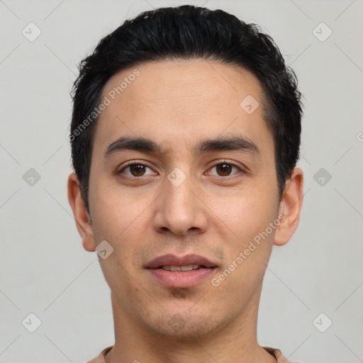 Joyful white young-adult male with short  black hair and brown eyes