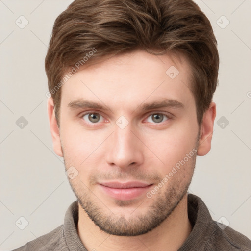 Neutral white young-adult male with short  brown hair and grey eyes