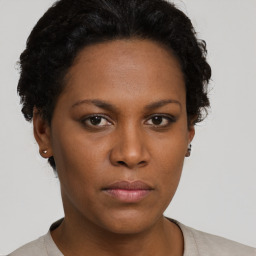 Neutral black young-adult female with short  brown hair and brown eyes