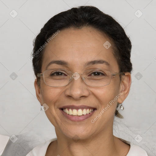 Joyful white adult female with short  brown hair and brown eyes