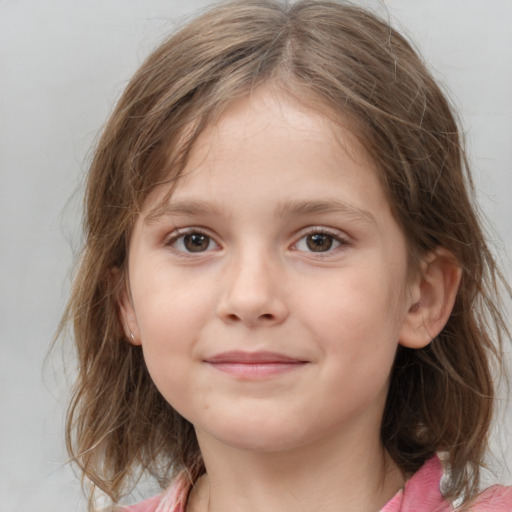 Joyful white child female with medium  brown hair and grey eyes