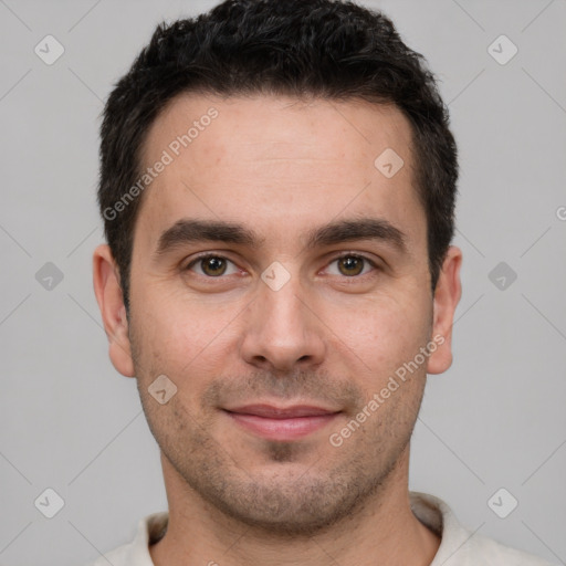 Joyful white young-adult male with short  brown hair and brown eyes