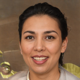 Joyful white adult female with short  brown hair and brown eyes