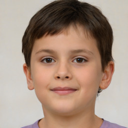 Joyful white child male with short  brown hair and brown eyes