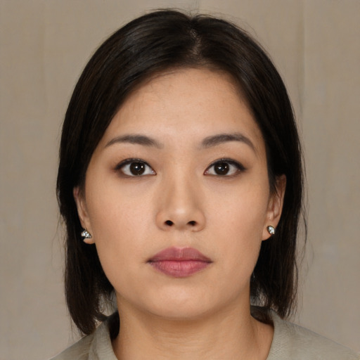 Neutral asian young-adult female with medium  black hair and brown eyes