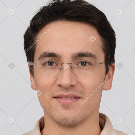 Joyful white adult male with short  brown hair and brown eyes