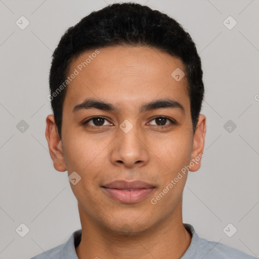 Joyful latino young-adult male with short  black hair and brown eyes