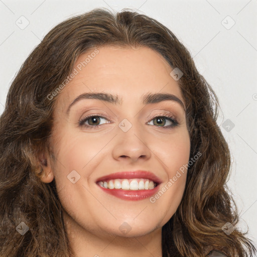 Joyful white young-adult female with long  brown hair and brown eyes