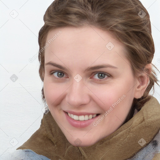 Joyful white young-adult female with medium  brown hair and blue eyes