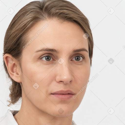 Neutral white young-adult female with medium  brown hair and brown eyes