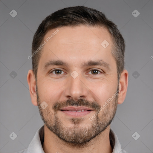 Joyful white adult male with short  brown hair and brown eyes