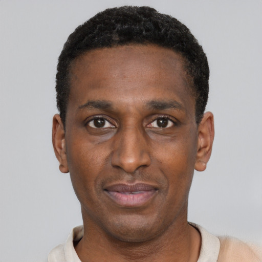 Neutral black young-adult male with short  black hair and brown eyes