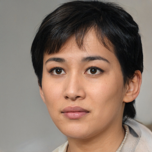 Neutral asian young-adult female with medium  brown hair and brown eyes