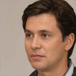 Neutral white adult male with short  brown hair and brown eyes