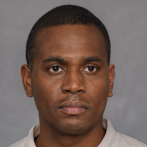 Neutral black young-adult male with short  brown hair and brown eyes