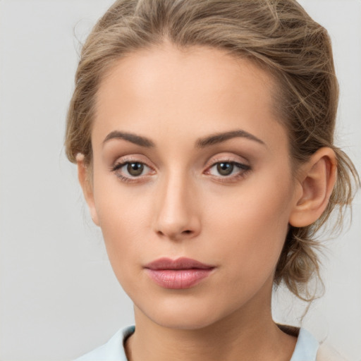 Neutral white young-adult female with medium  brown hair and brown eyes