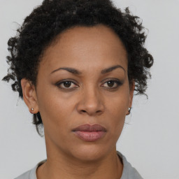 Neutral black young-adult female with short  brown hair and brown eyes